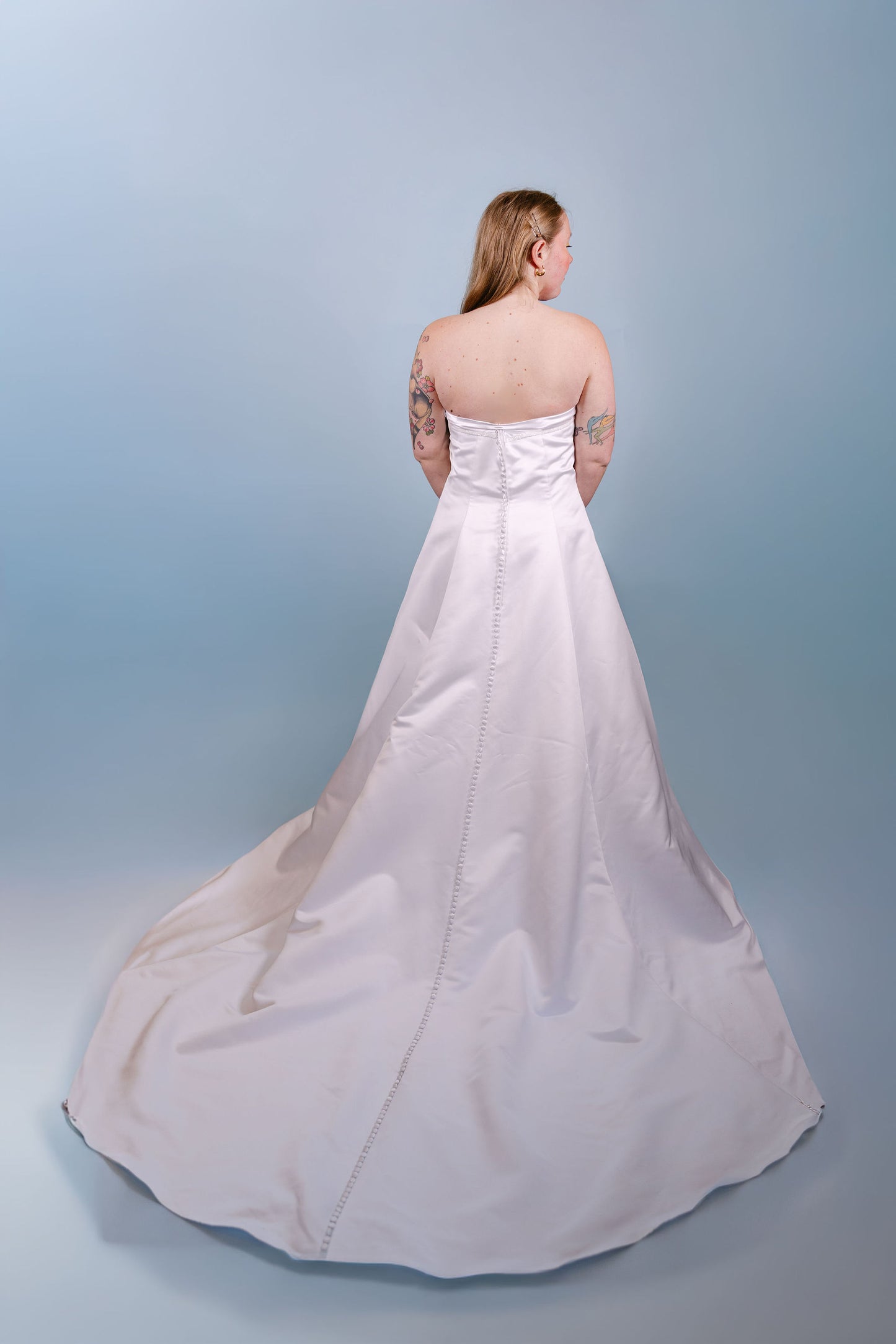 Paris: 2000s, white strapless with little beads and bow