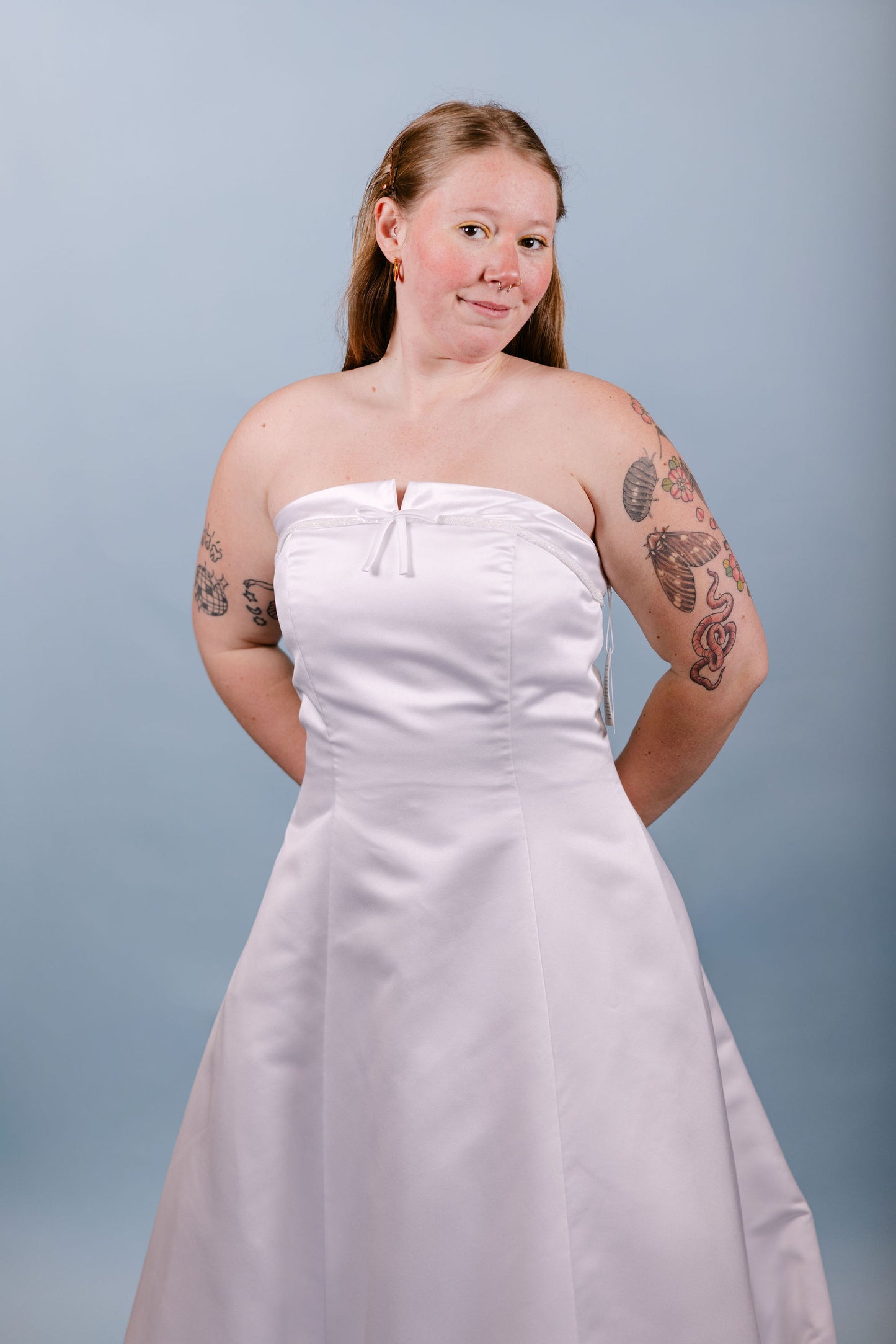 Paris: 2000s, white strapless with little beads and bow