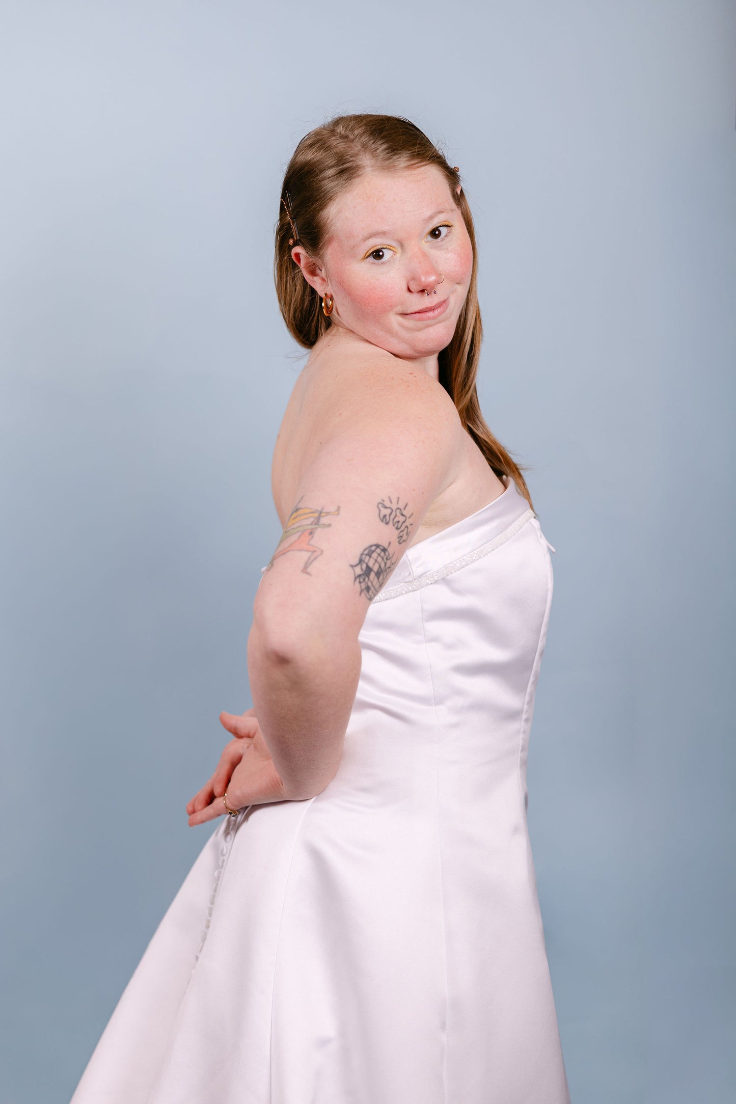 Paris: 2000s, white strapless with little beads and bow