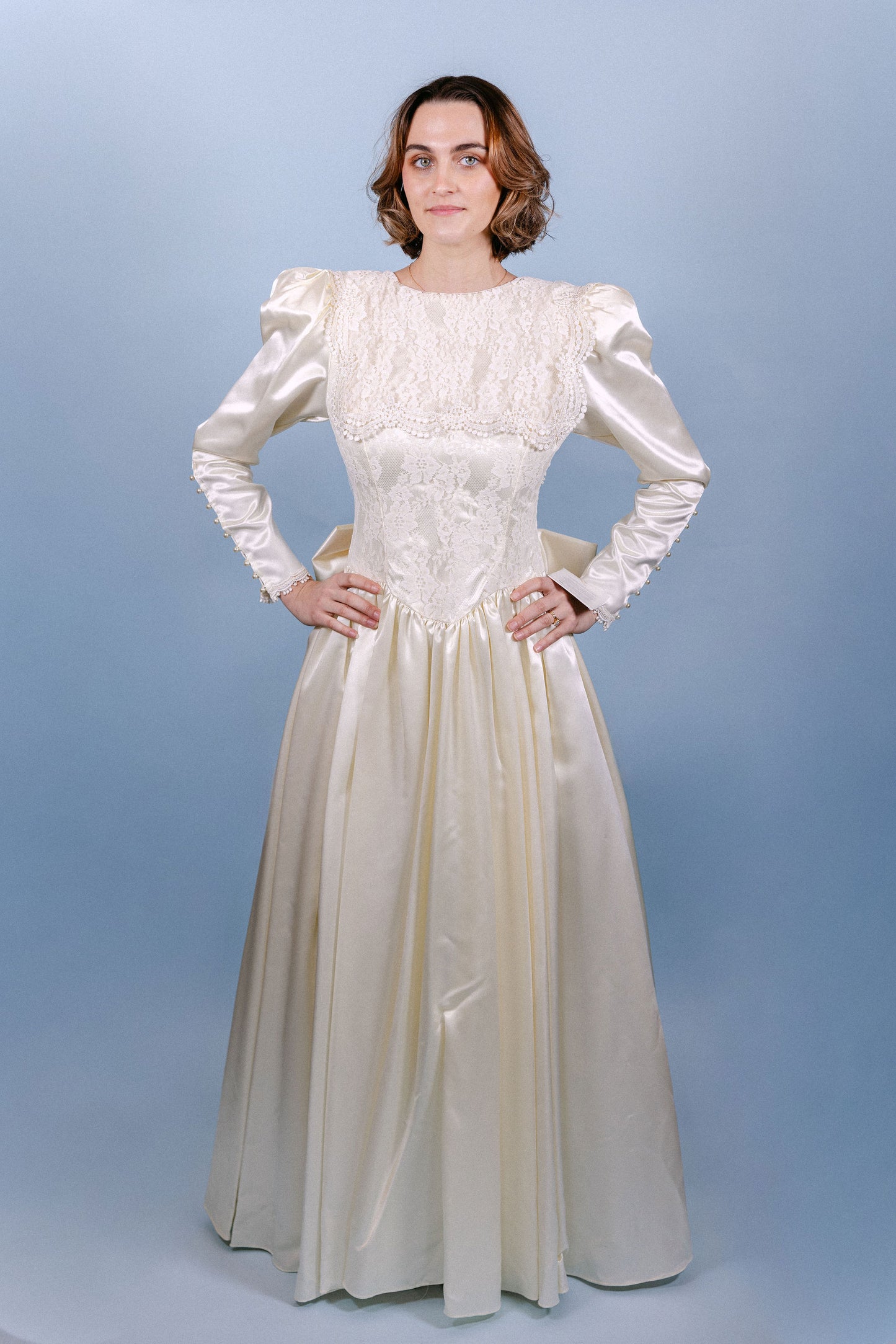 Rebecca: 1989, ivory, LS, big bow on butt, small train