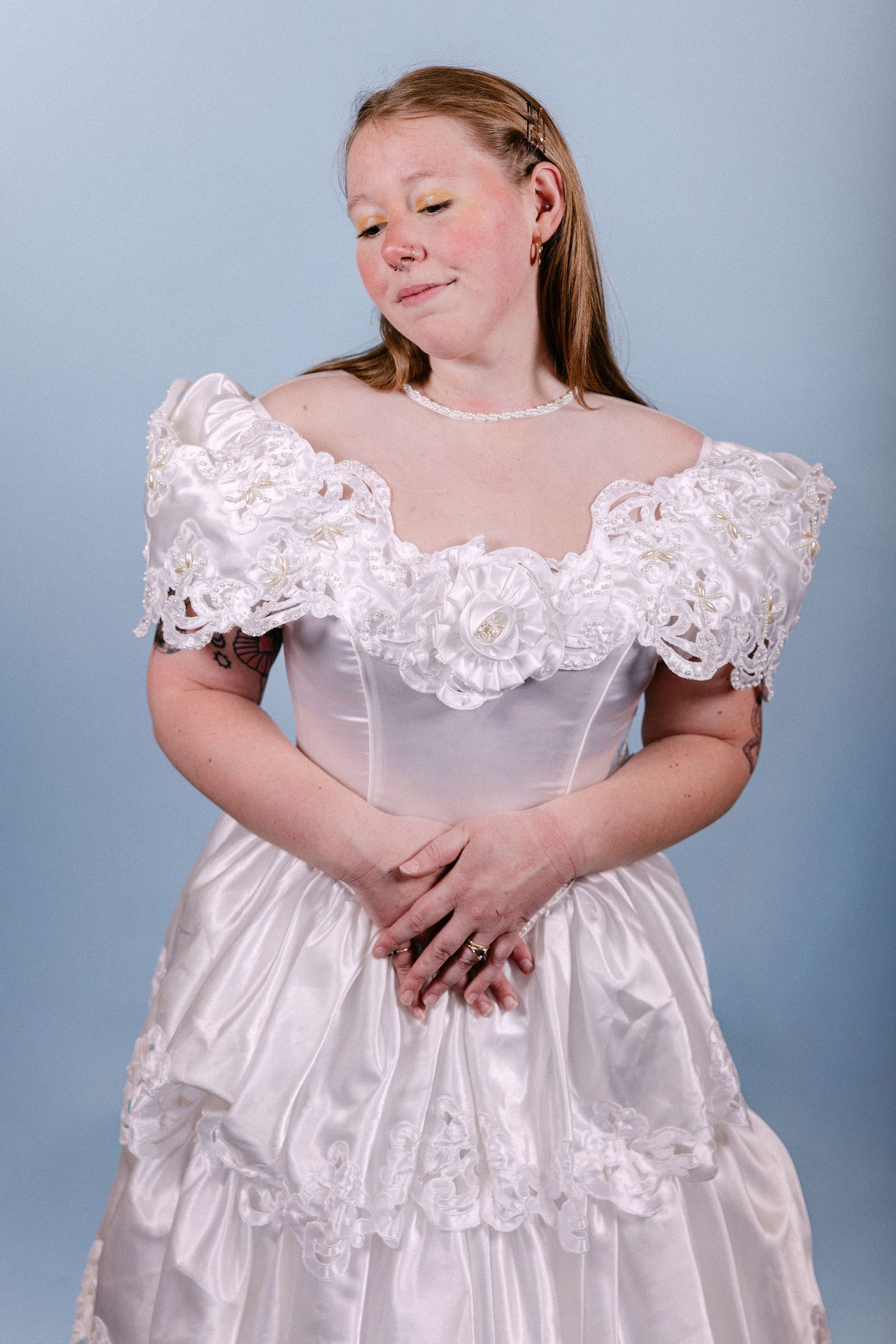 Brenda: 1980s, A-line with poofy tiers, and pearl/floral/sheer neckline