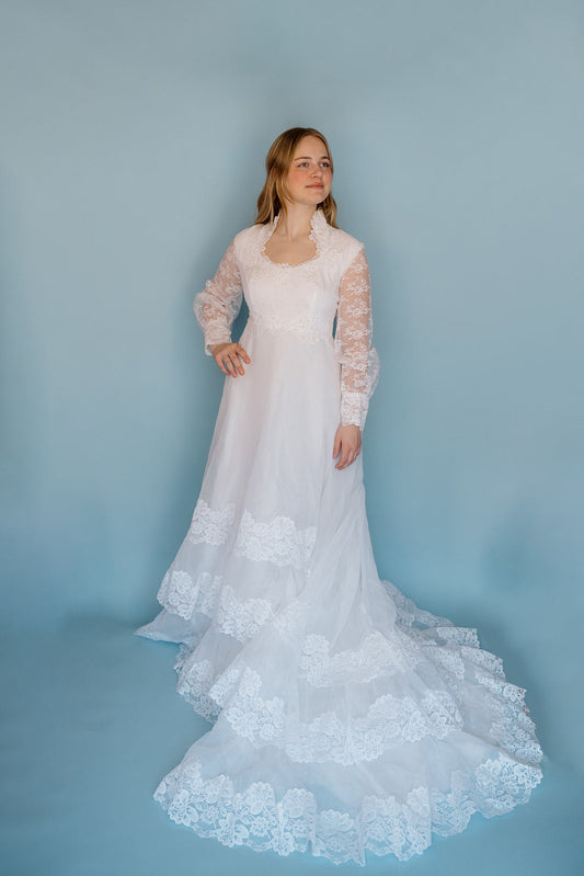 Morris: 1978 white, tiered skirt with tulle, long sleeves wedding dress